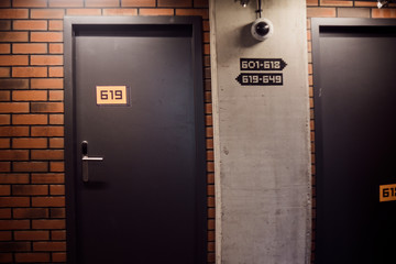 University hostel, doors and corridor. On the doors of the room numbers, the hostel. Dormitory