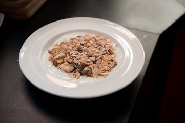 homemade muesli on white dish