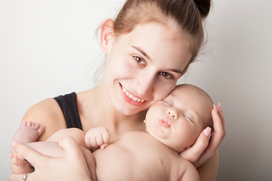 Teen mother and Newborn baby boy portrait