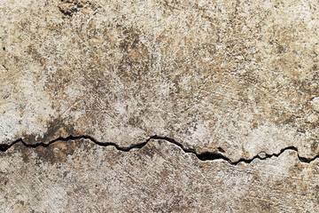 gray concrete wall texture with crack. white or grey stucco cement old texture rough and brown and gray stain dirty. stone grunge design background