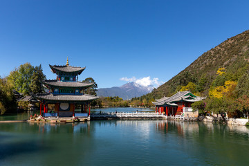 Black Dragon Pool and Wufeng Tower in Jade Spring Park, Lijiang, Yunnan Province, China