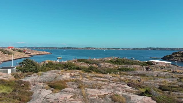 The Beautiful Tourist Attraction in Pinnevik, Lysekil Sweden With Clear Blue Sky Above - Aerial shot
