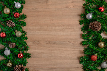 Fototapeta na wymiar Christmas fir tree with decoration on wooden board