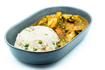 Chicken curry with rice and green bean on plate isolated on white background