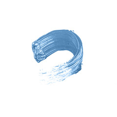 A smear of blue acrylic paint on a white isolated background