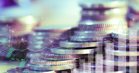 Financial investment concept, Double exposure of city night and stack of coins for finance investor, Forex trading candlestick chart, Cryptocurrency  Digital economy. background for invest