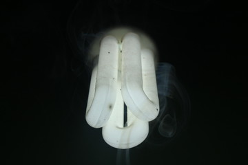 horizontal view of Bulb with misty smoke or white tube light / bulb with smoke or heat bulb or tube light produce smoke