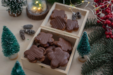 Home made sweet german chocolate christmas cookies on a festive table 