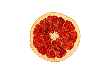 one slice of dried grapefruit close-up on white background