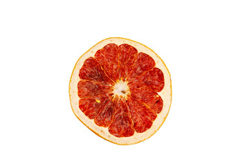 one slice of dried grapefruit close-up on white background