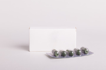 White pills box. Plastic bottles. Drugs box mock-up. Medical blank cardboard. Mockup. Pills bottle