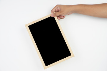 Mens hand holding blackboard over white background. Copy space concept