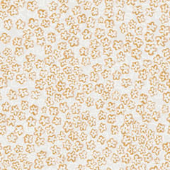 Delicate simple floral seamless pattern in golden autumn colors.