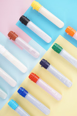water colour tubes on a colourful paper