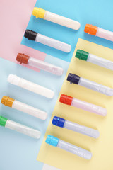 water colour tubes on a colourful paper