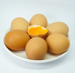 organic eggs in white dish isolated on white background