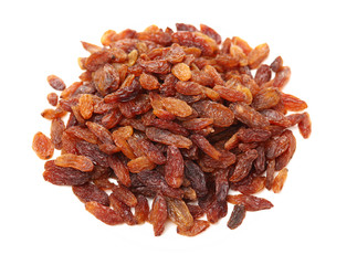 brown raisins on a white background