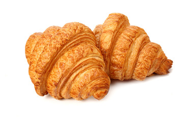 two fresh croissants isolated on white background