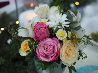 beautiful bouquet of roses on the holiday table