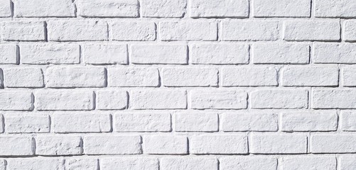 Pattern white brick wall painted for background. Art wallpaper and Architecture Exterior design concept 