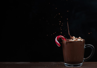 Christmas cocoa on a dark background with splashes