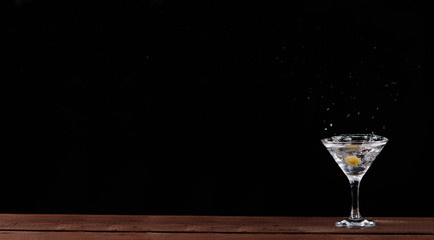 in a Martini glass olive flies