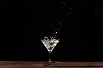 in a Martini glass olive flies