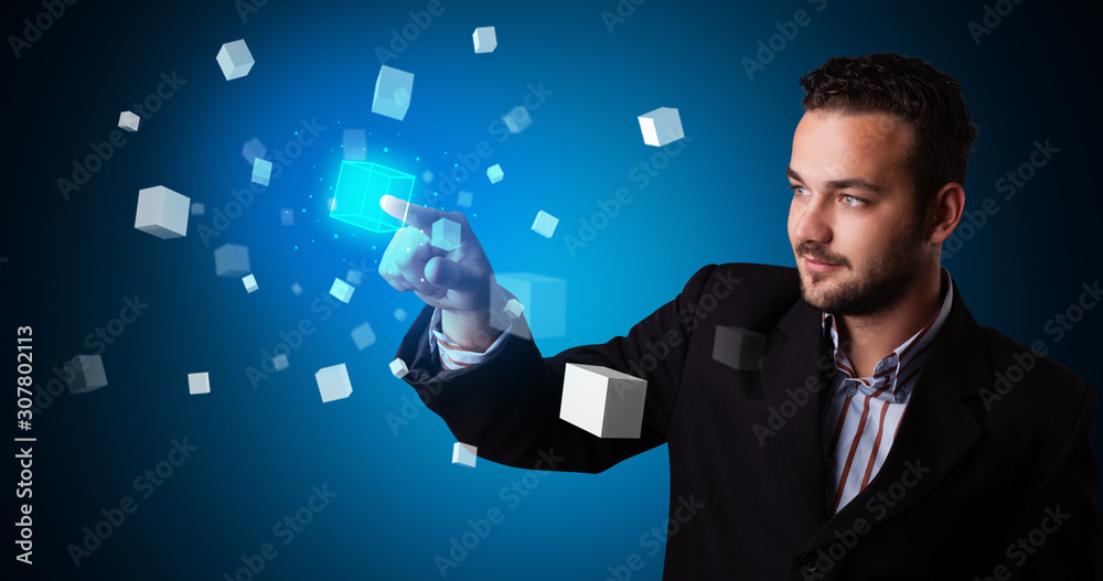 Poster Man touching hologram screen displaying cube symbols