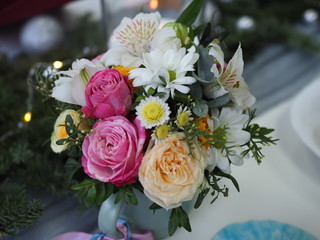 beautiful bouquet of roses on the holiday table
