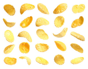 Set of tasty crispy corn flakes on white background