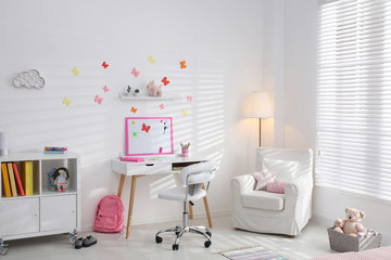 Modern child room interior with stylish furniture