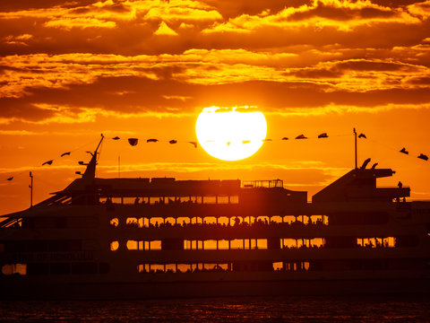 passenger cruise ship by sun