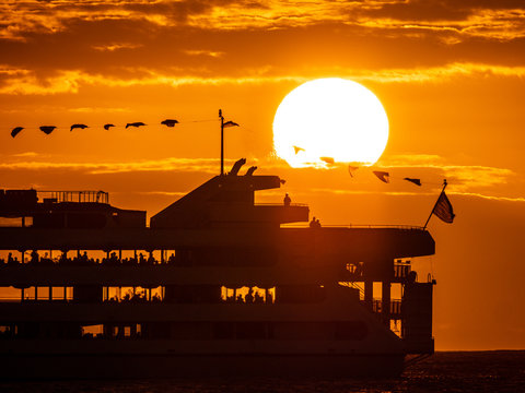 passenger cruise ship by sun