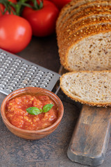 Crusty bread with fresh tomato or pan con tomate in Spanish, popular tapa  in Spain.