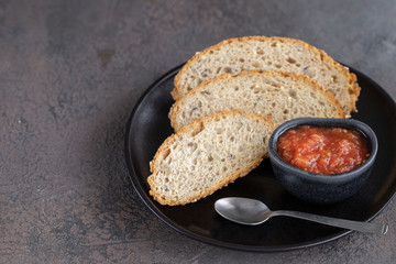 Pa amb tomaquet or tomaca (bread with tomato) classic snack in Catalan and Spanish cuisine, eaten for breakfast.