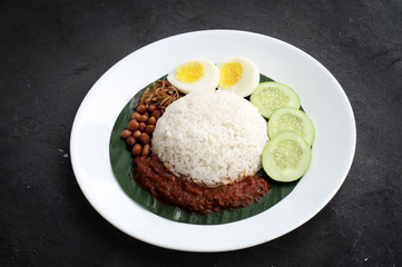 Nasi Lemak served on a banana leaf