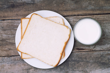 Top view of bread and milk