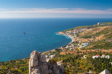 Fototapeta na wymiar View from nearest mountains on wonderful Blue Bay near Simeiz town Crimea, Ukraine
