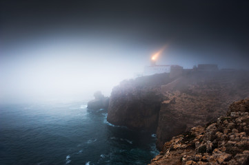 Lighthouse on Cape St. Vincent in misty night, Algarve, Portugal. This is the most South-Western...
