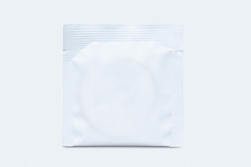 Condom pack copyspace mockup advertising design. condom on white background. White condom sachet mock up.