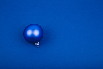 Holiday background with little blue ball