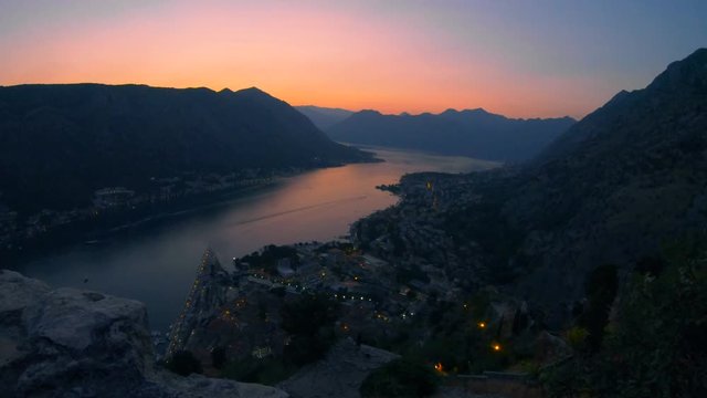Sunset over the bay and mountains, Montenegro. View of Kotor from Castle Of San Giovanni, top of the hill