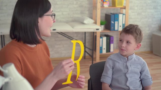 little boy at a reception of a speech therapist close up