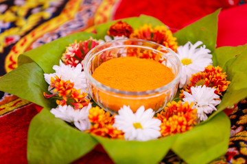 Traditional  wedding ceremony in Hinduism: Turmeric in bowl for haldi ceremony  