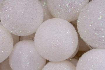 New Year and Christmas still life.White balls for the Christmas tree. Selective focus.