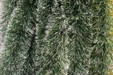 New Year and Christmas still life. Tinsel for the Christmas tree. Selective focus.