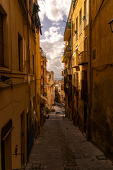 View at narrow street in Italy.