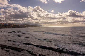 Clouds over Alghero seafront. Sardinia, Italy.