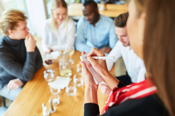 The waitress makes an order in the bistro