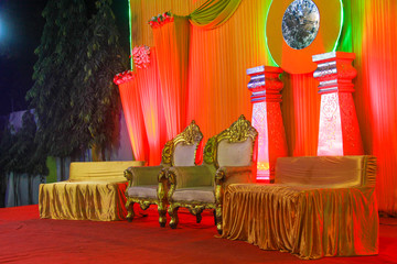 indian wedding ceremony :stage decoration with lighting and flower 